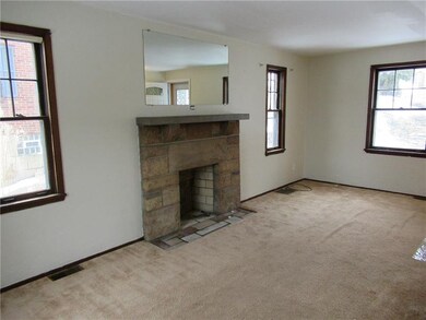 Light and bright living room with original hardwoo