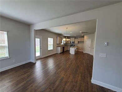 View from Great Room. Dining area and kitchen ~ ph