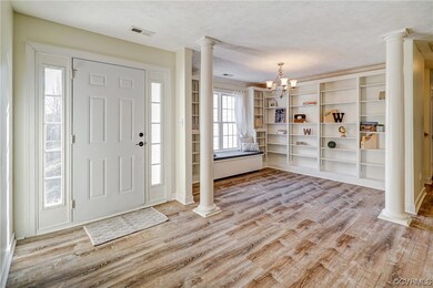 Foyer entrance with a notable chandelier, decorati