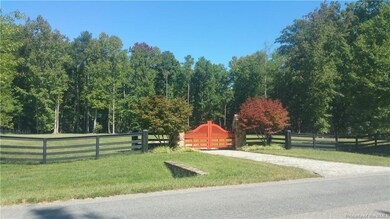 The private entrance for Lot 3. Stone columns, cob