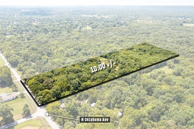 View of property location featuring a forest and property boundaries highlighted