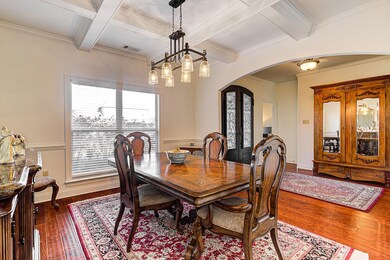 Dining area with french doors, dark hardwood / woo