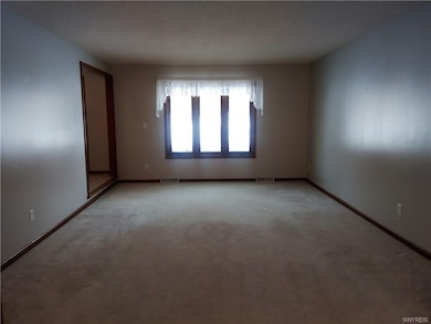 This living room overlooks the front yard.