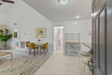 Dining area featuring baseboards, visible vents, r