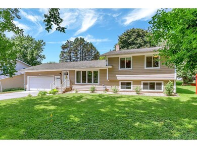 This attractive four level home is nestled in a pr