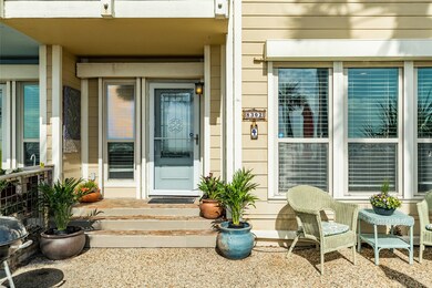Townhome has exterior roll-down storm shutters on