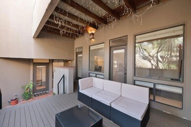 Wooden terrace featuring outdoor lounge area