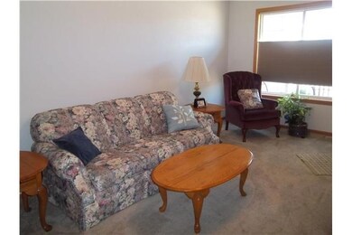 Other. Main level living room.  Front window has c