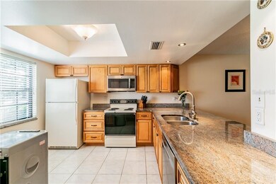 New wooden cabinetry with upgraded light fixtures.