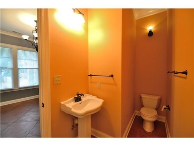 Pretty pedestal sink and oil-rubbed bronze fixture
