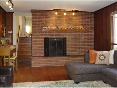 Living Room. Fireplace is gas, lower level on is w