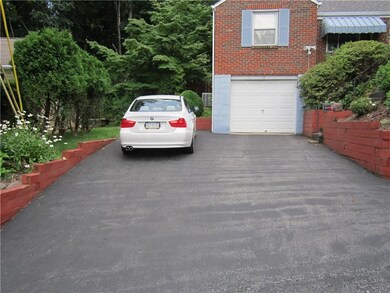 exterior front with extra parking for 4 cars