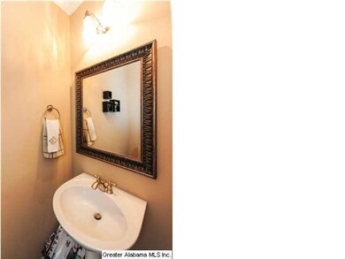 Half bathroom with decorative mirror & pedestal si
