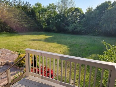 VIEW OF YARD FROM DINING ROOM DECK
