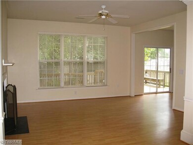 Den/Family/Great Room. View from the dining room looking into living room.  Easy access to the deck from the breakfast room.