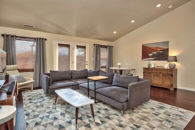 The spacious living room offers great-room styling