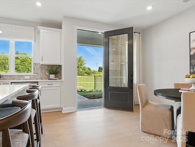 Front Entry Through 8' Doorway. *Model Photos | Actual Finishes, Structural Selections, and Orientation May Vary.