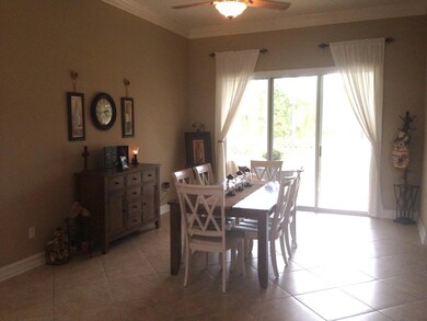 Living room opens to large screen porch