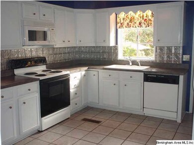You will love the large eat in kitchen with lots o
