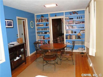 Dining Room. diningroom with built-ins leads to ki
