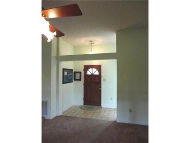 Tiled Entry with Soaring Ceilings and Tons of Wall