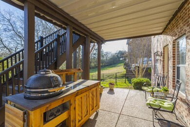 A covered patio gives a second option to grill and enjoy sitting outside.