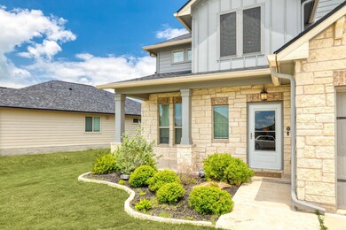Entrance to property with board and batten siding