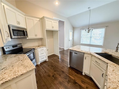 1517 Johnston Dr, Raymore, MO 64083 - photo 2