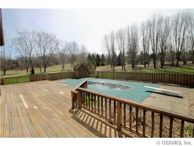 Deck Deck steps down to pool, and has room for a h