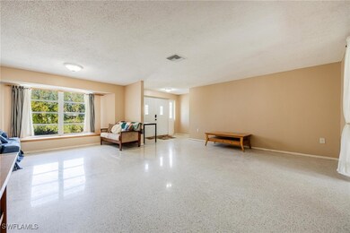 Living area with a textured ceiling
