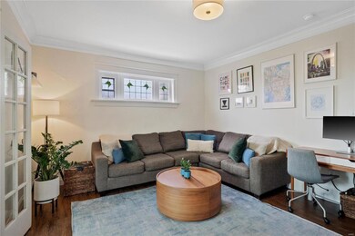Spacious living room, check out the stained glass 