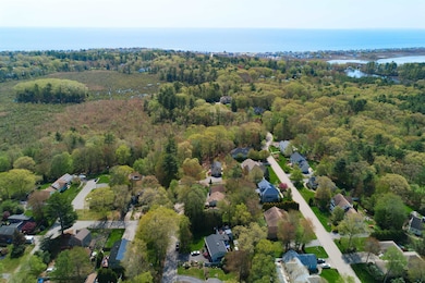 Enjoy NH living close to the beach with easy access to shopping, restaurants & schools