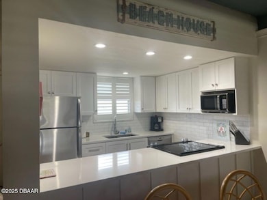 4849 Saxon Dr unit C102, New Smyrna Beach, FL 32169 - photo 6