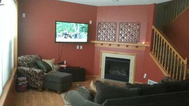 Warm & cozy living room and fireplace.