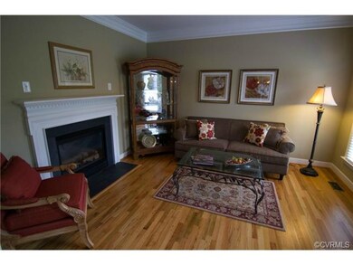 living room with gas fireplace triple crown mldg 9