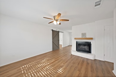 Updated open concept living room with fireplace