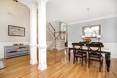 Foyer, living room (could easily add a wall and co