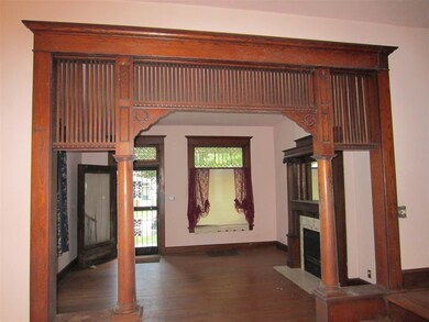 The Living Room has a beautiful oak fireplace mant