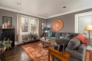 Beautiful hardwood floors and natural light throug