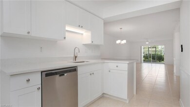 Kitchen featuring stainless steel dishwasher, a si