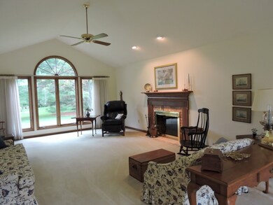 featuring large window view of the back yard