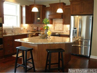 Gourmet kitchen with double ovens, granite counter