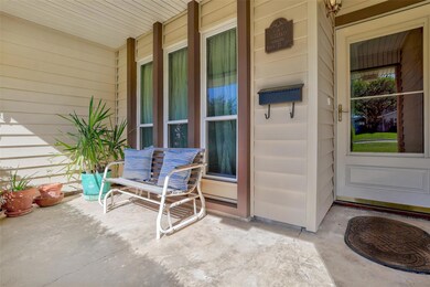 The covered front porch is the perfect space to sip morning coffee and greet the neighbors!