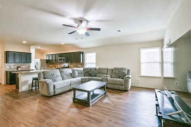 Living and dining. Open with 9 foot ceilings