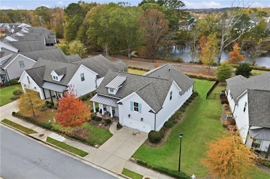 Aerial view of residential area with a nearby body of water