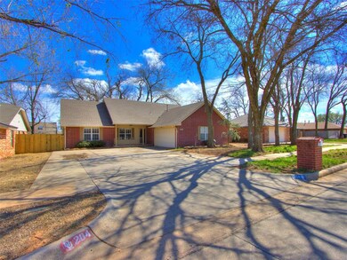 Ranch-style home featuring a garage