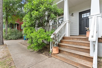 View of exterior entry featuring a porch
