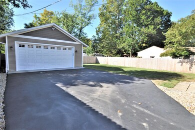 New 24' x 22' Garage w/8' tall door!