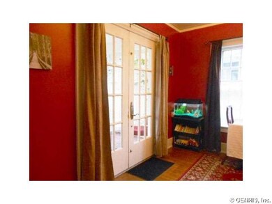 Dining Room. French doors lead to the front porch.