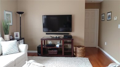 Living area gets lots of sunshine and light. Door 